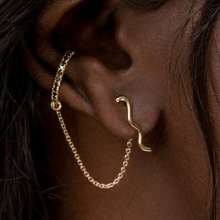 Black Diamond Pavé Ear Cuff & Chain on woman's ear