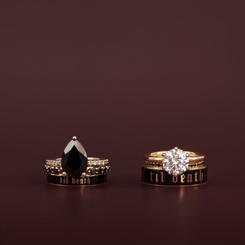 til death enamel band stacks against a red background