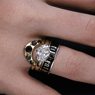 Ophelia east-west lab-created diamond engagement ring stacked with the Black Diamond Crescendo Stacking Band and a black enamel Til Death band