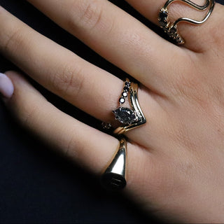 Black Diamond Cosmic Light Open Shank Band worn in a dark ring stack