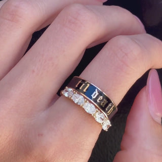 Video of the 6mm Til Death black enamel band stacked with a white diamond band on hand