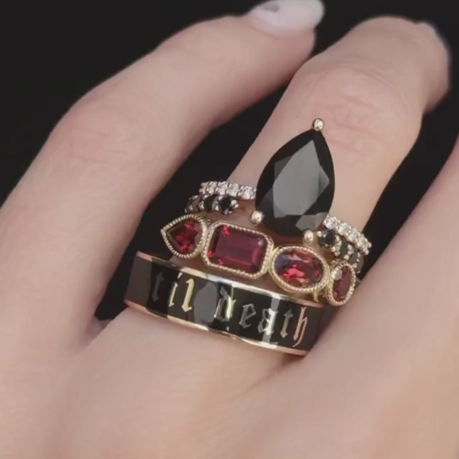Video of the Sweet Melissa Black Onyx Ring styled three ways on hand: with a Cherry Mocha Til Death enamel band, with a garnet mixed shape band and black Til Death band, and with a silver Til Death band and Curvy Black Diamond Headdress Jacket