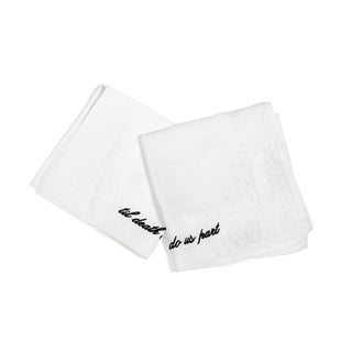 Two white handkerchiefs with black text on a white background