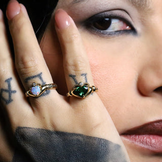 Tsavorite and Opal Sempre rings, Til Death World x Sammi Jefcoate, worn together on the hand